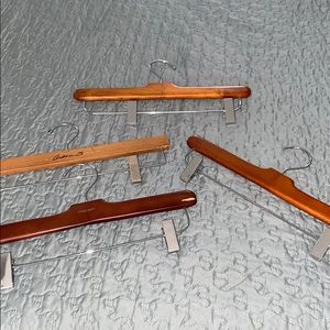 4 Pant hangers. Solid wood. In great shape.